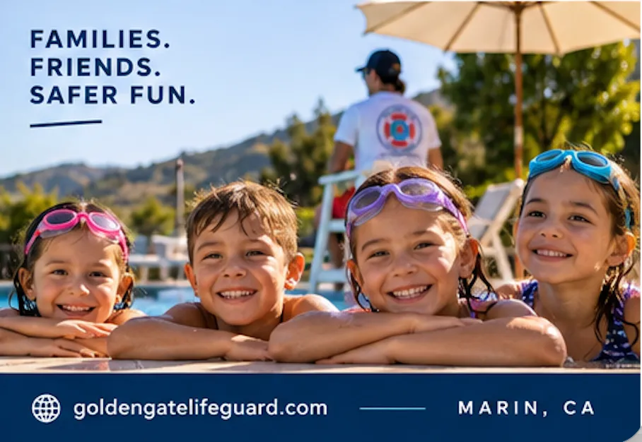 Four children rest their arms on the pool edge with a lifeguard on a stand behind them.